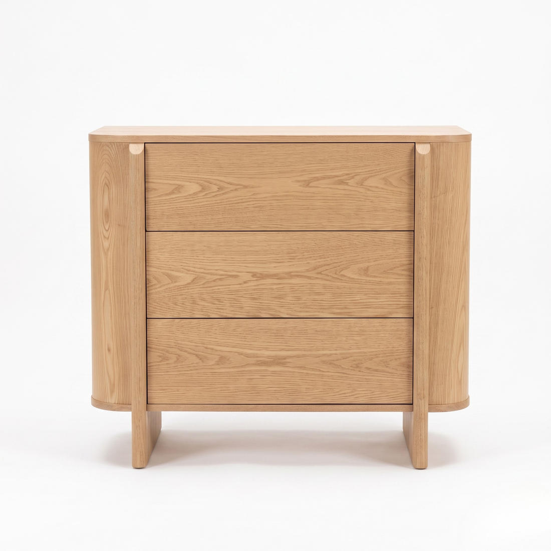 Wooden three-drawer dresser on a white background