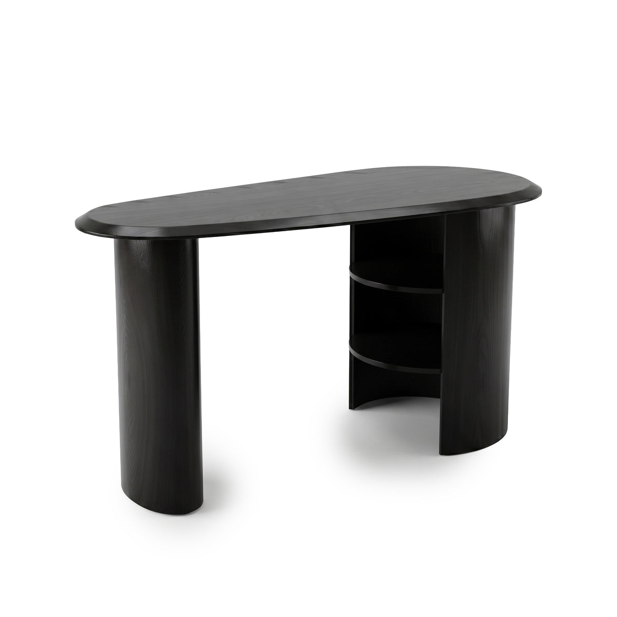 Sleek black desk with asymmetrical oval top and built-in shelving on a white background