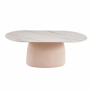 Contemporary oval coffee table with white marble-effect top and blush pink base on white background