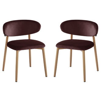 Audrey Fabric Dining Chair Set of 2 in Dark Plum features modern-style chairs with light wood-toned, splayed cylindrical legs, and plush, oval-shaped, burgundy upholstered backrests for a chic, minimalist look.