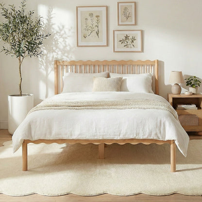 Light wood bed frame in cozy bedroom with nightstand and plant