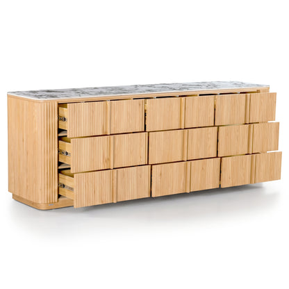 Modern sideboard with several drawers open on a white background