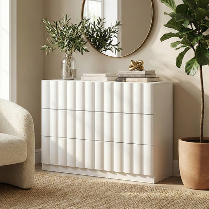 Modern white six-drawer dresser in bright styled living room with decor