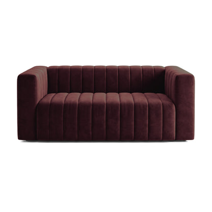 Dark Merlot upholstered sofa on a white background
