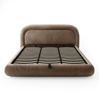 Taupe upholstered bed frame with exposed wooden slats on a white background
