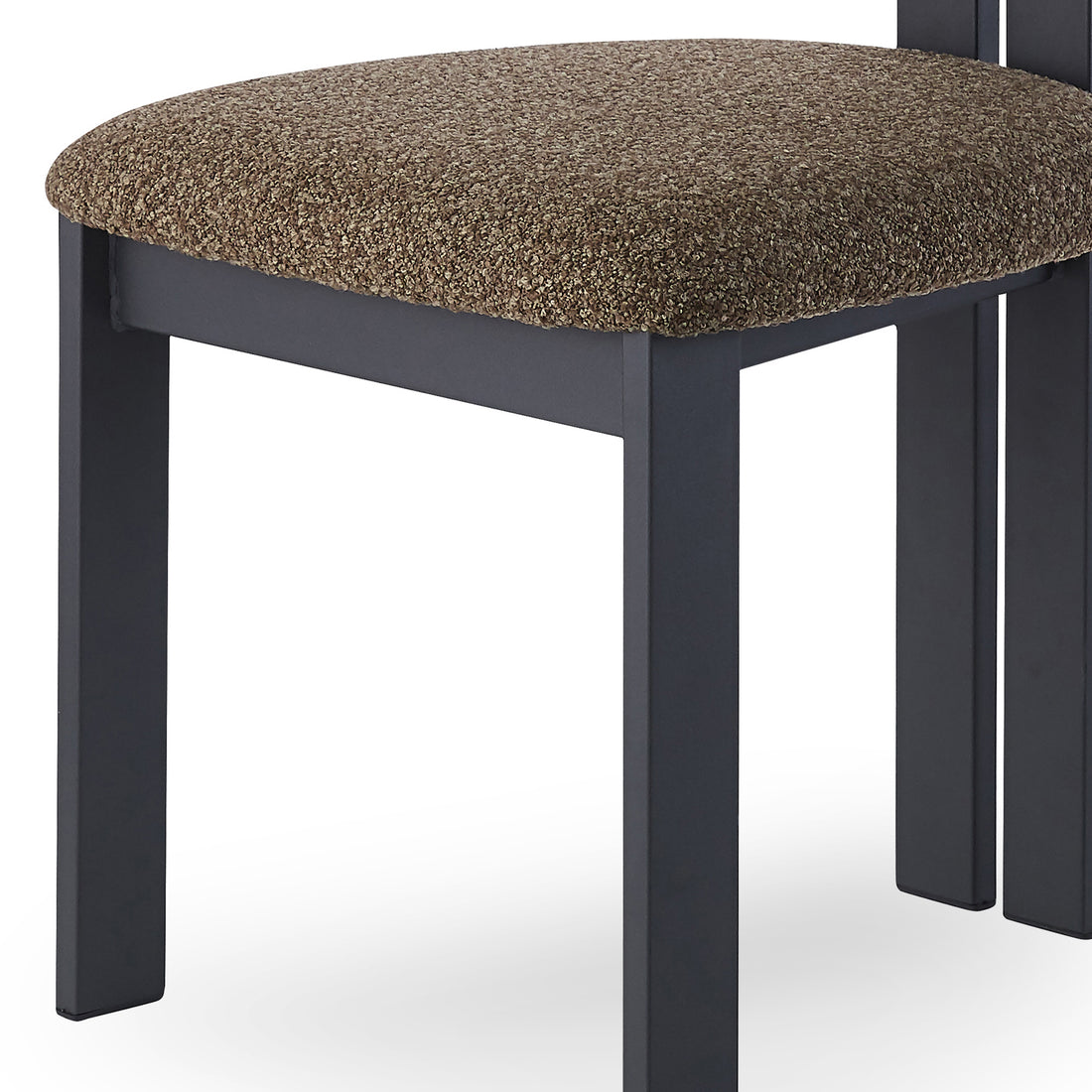 Haleo Curved Boucle Dining Chair Set of 2 features black-metal legs supporting a thick, textured cushion, exuding modern elegance and comfort. Perfect for enhancing dining spaces with refined, supportive seating.