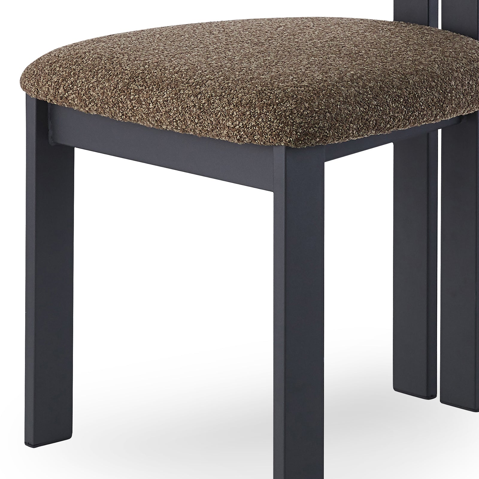 Haleo Curved Boucle Dining Chair Set of 2 features black-metal legs supporting a thick, textured cushion, exuding modern elegance and comfort. Perfect for enhancing dining spaces with refined, supportive seating.