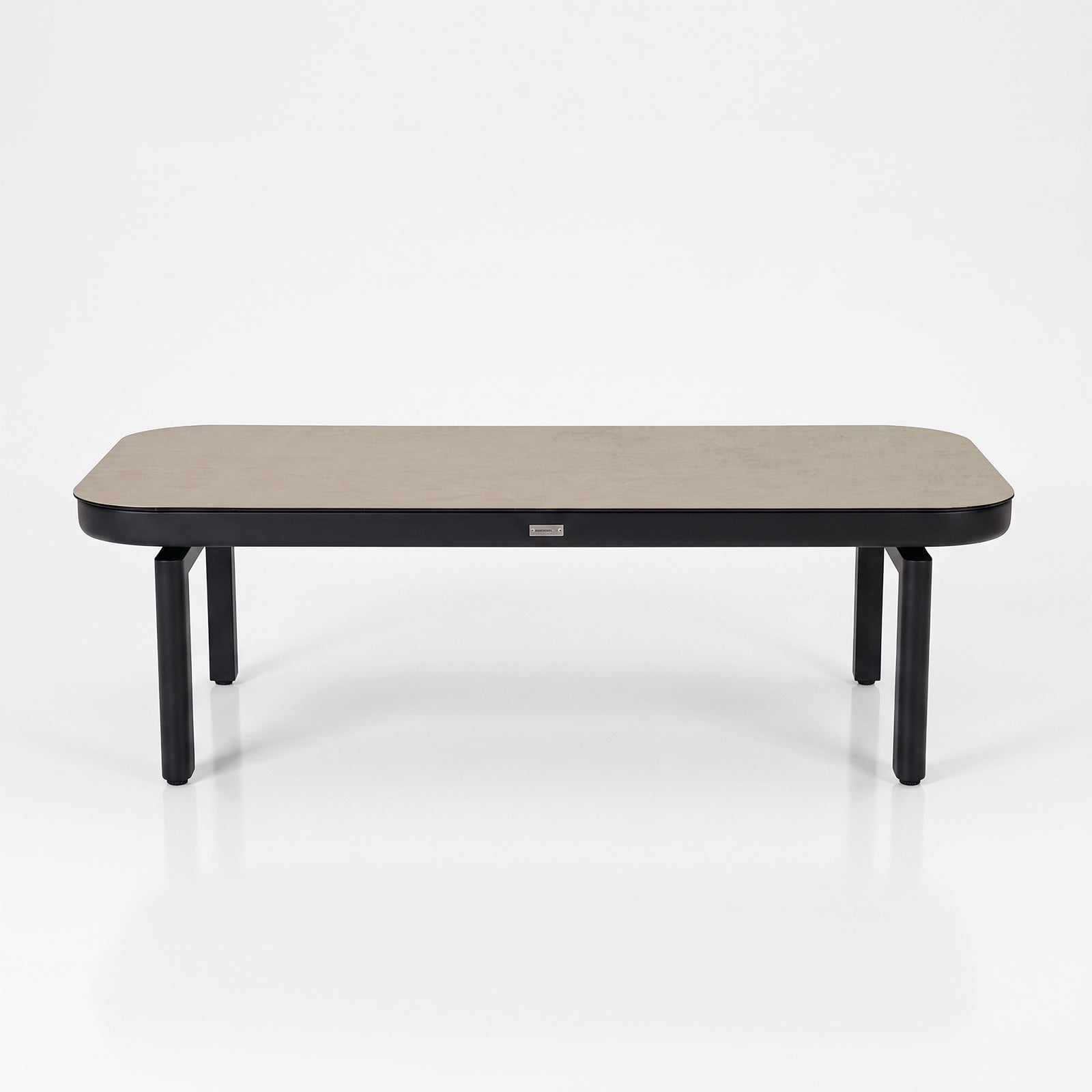 Rectangular table with rounded edges on white background.