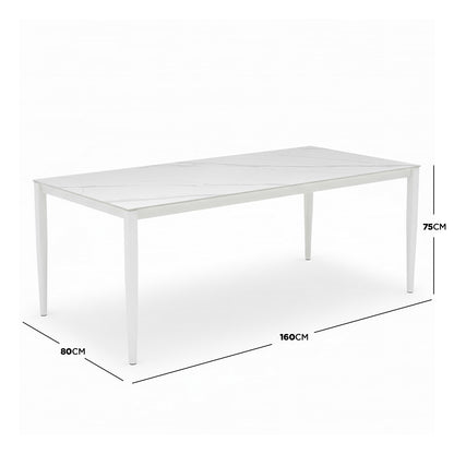 Cabria 7 Piece Sintered Stone Outdoor Dining Set features a sleek rectangular table with a marble-effect top and slim legs, with dimensions of 160 cm by 80 cm, 75 cm high.