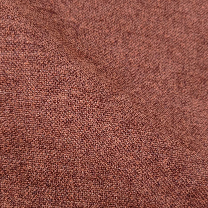 Macro close-up of terracotta woven upholstery fabric