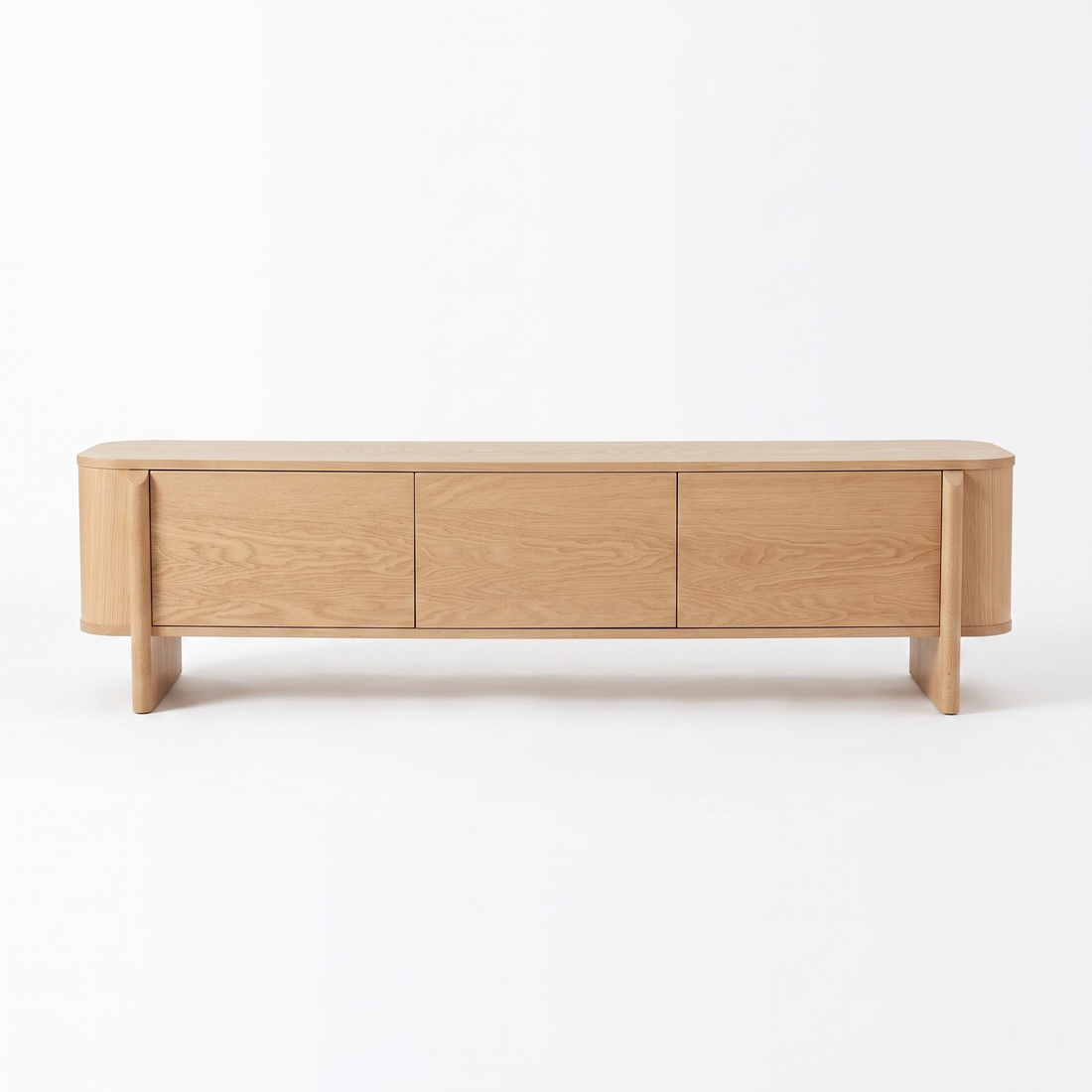 Light wood sideboard on a white background with three front doors and rounded ends