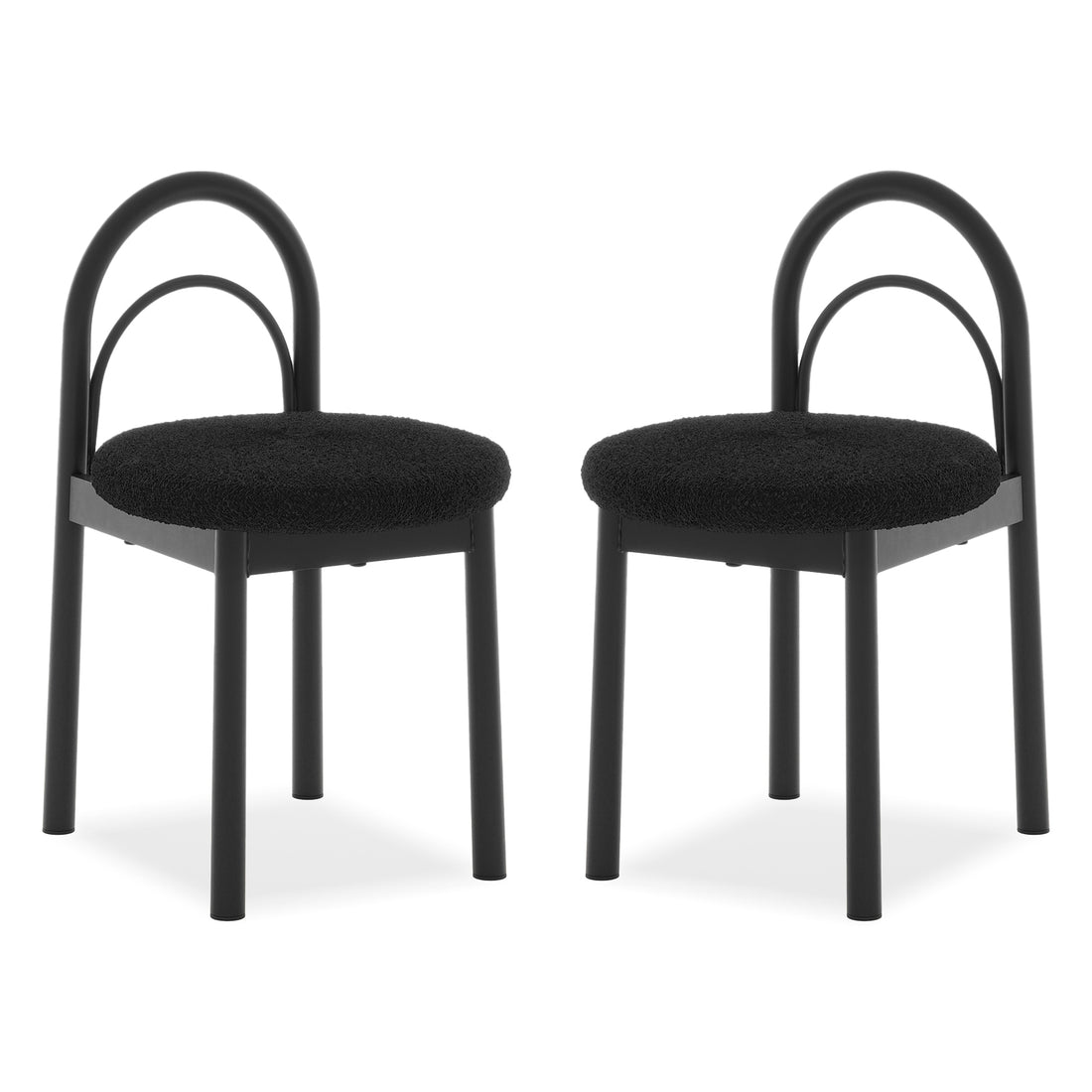 Two modern black chairs with curved backrests and padded seats on a white background