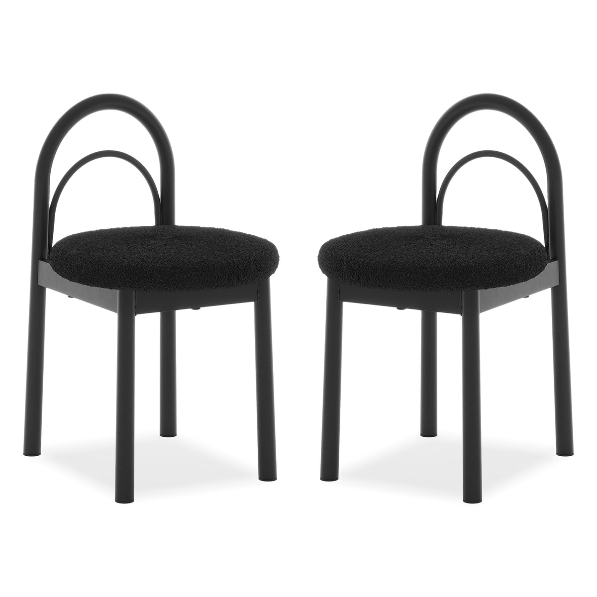 Two modern black chairs with curved backrests and padded seats on a white background