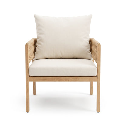 Modern wooden armchair with cream cushions on white background
