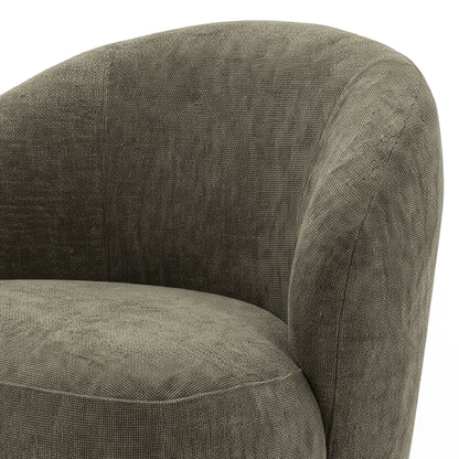 Close-up of the upper portion of a curved upholstered accent chair on a white background