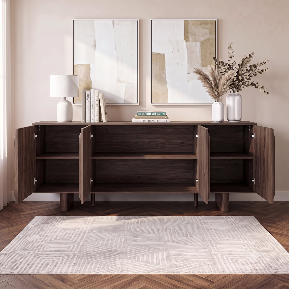 Dark wood sideboard in a styled room with lamp, books, artwork, and rug.