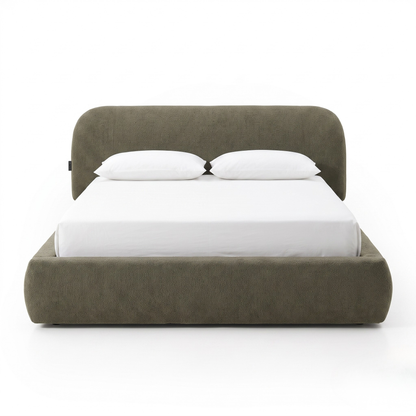Full upholstered bed on a white background with white bedding