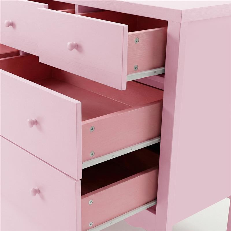 Close-up of open drawers and metal runners on pink dresser