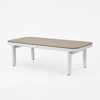 Rectangular coffee table with a wood-like top and white frame on a white background.