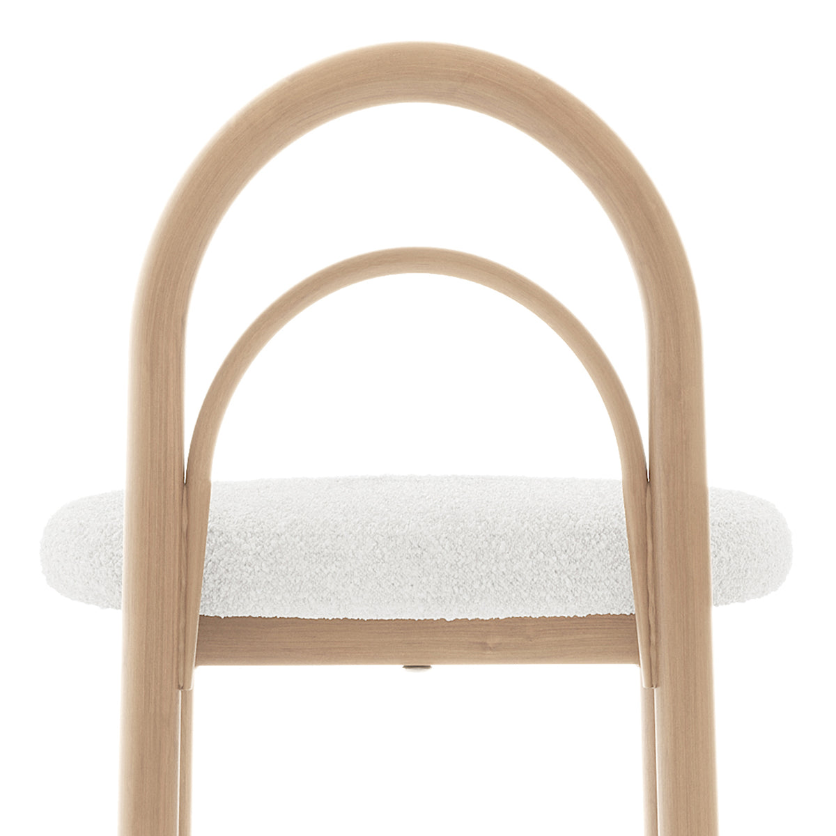 Upper portion of a modern chair with curved backrest and white cushioned seat on a white background