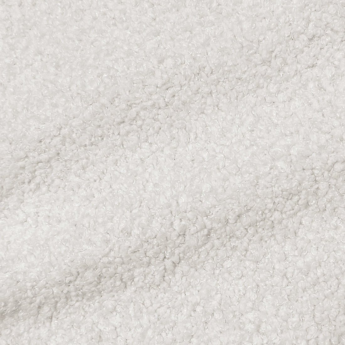 Close-up of white textured sherpa-like fabric