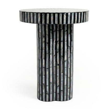 Full view of black and iridescent striped round side table on white background