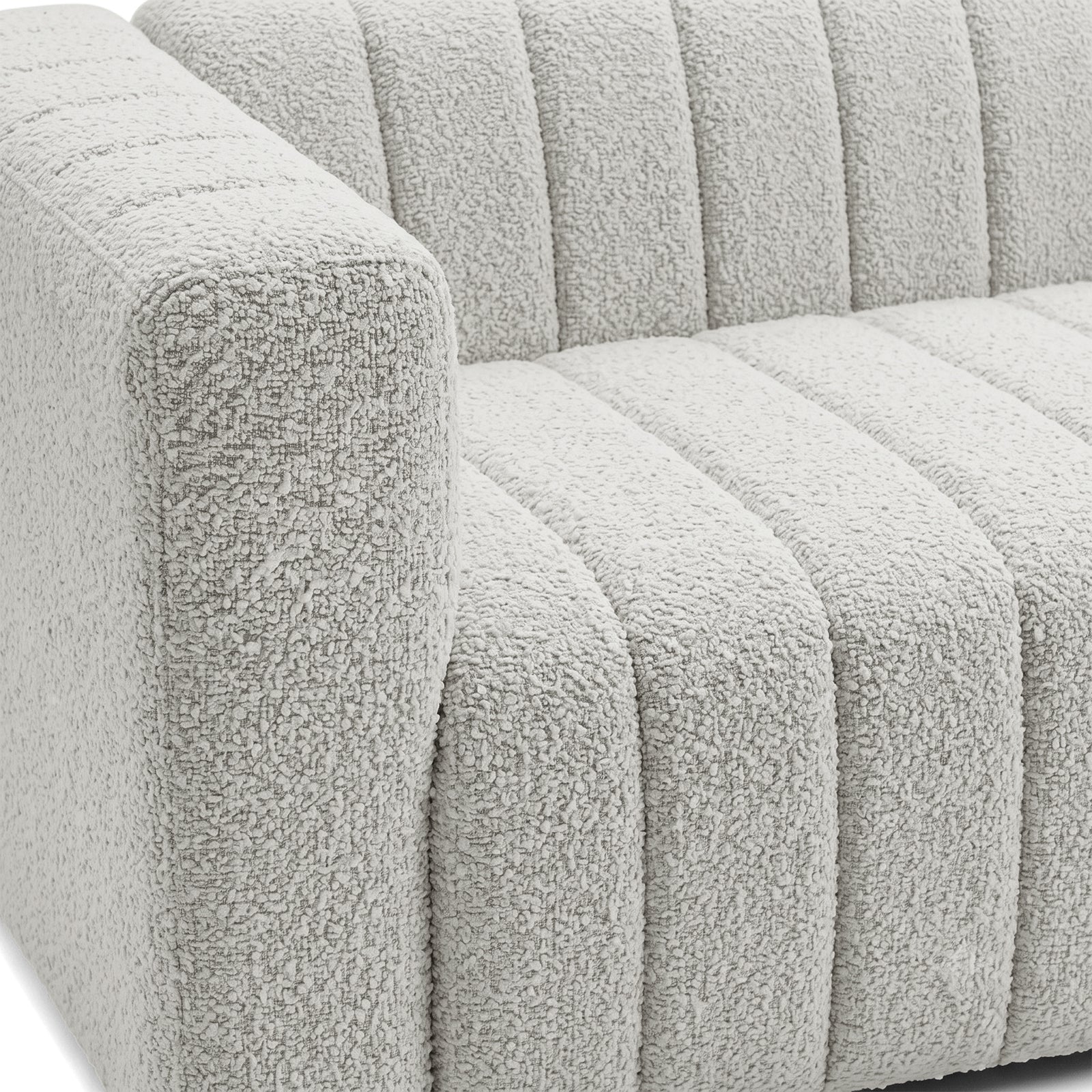 Close-up of a modern sofa arm and seat upholstery