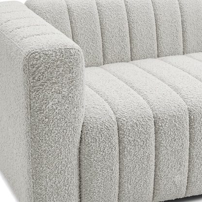 Close-up of a modern sofa arm and seat upholstery