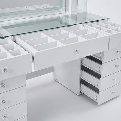 Detail view of vanity table storage compartments and open drawer sections on white background