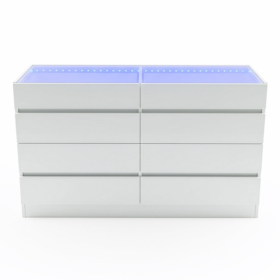 Modern white chest of drawers with eight handle-less drawers and blue-tinted glass top on white background