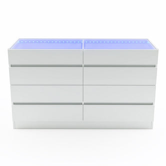 Modern white chest of drawers with eight handle-less drawers and blue-tinted glass top on white background