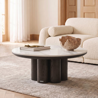 Round coffee table styled in a modern living room
