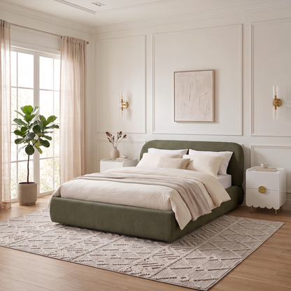 Modern upholstered bed styled in a bright elegant bedroom