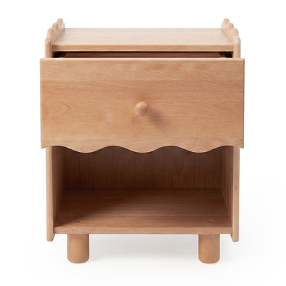 Wooden nightstand with scalloped drawer front on white background