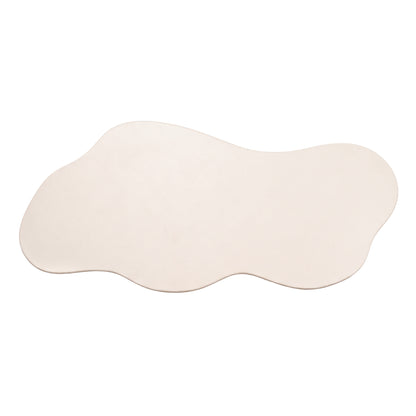 Light-colored organic-shaped rug or mat on a white background