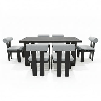 Positano 6 Seater Outdoor Dining Set in Black & Grey featuring a sleek black table with slatted top, six matching chairs with light-gray cushions, and cylindrical bolster backrests, perfect for stylish outdoor gatherings.