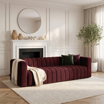 Dark Merlot sofa styled in a modern living room