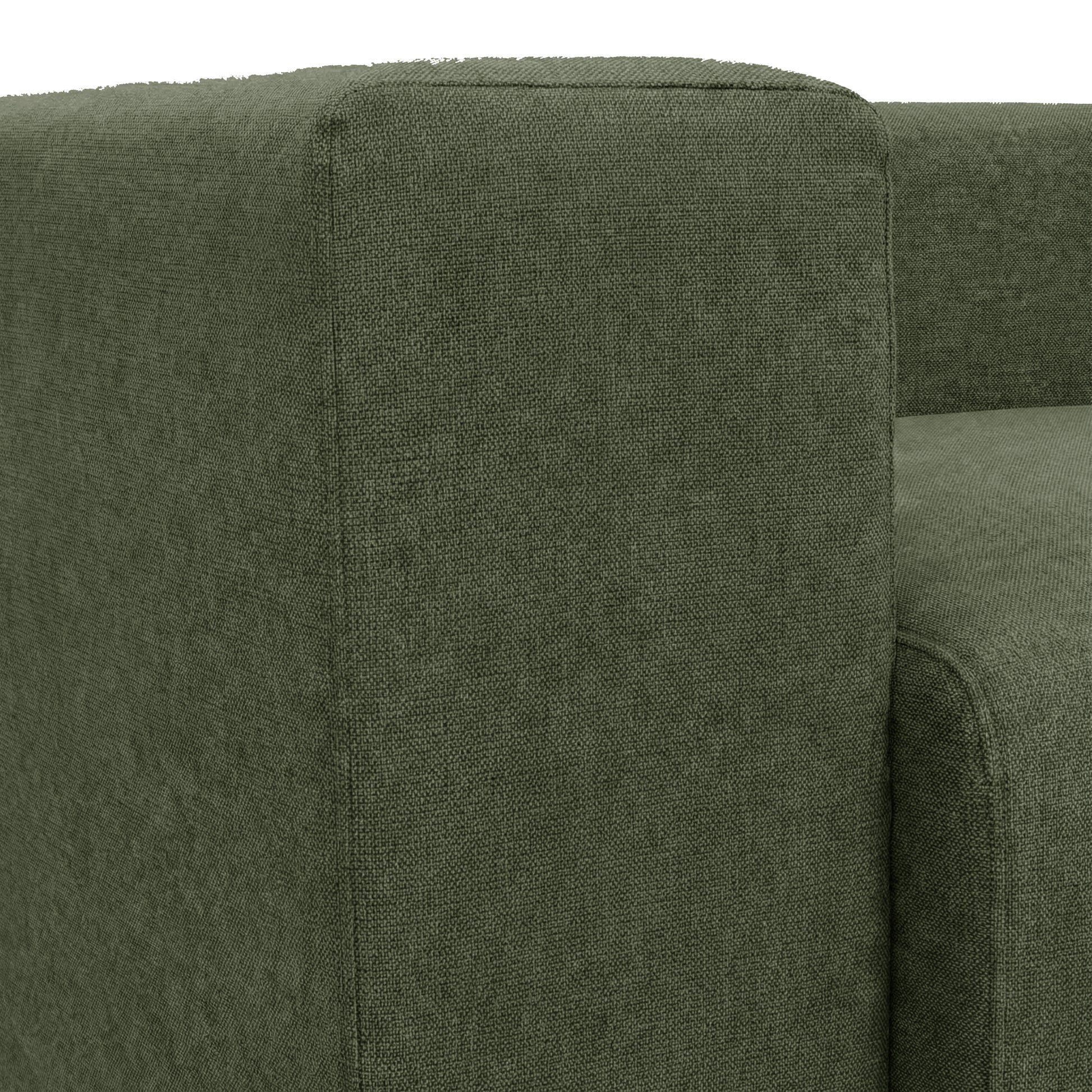 Close-up of green sofa armrest and fabric texture on white background