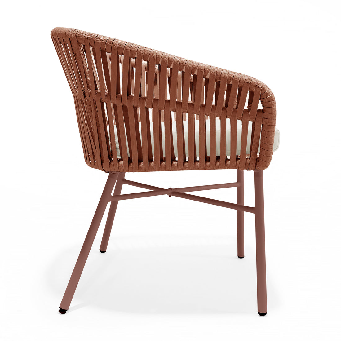 Marula Rope Outdoor Dining Chairs in Terracotta Set of 4 featuring rust-brown tubular metal frames with angled legs, woven terracotta rope sides, and light-colored seat cushions, offering a modern, relaxed outdoor dining experience.