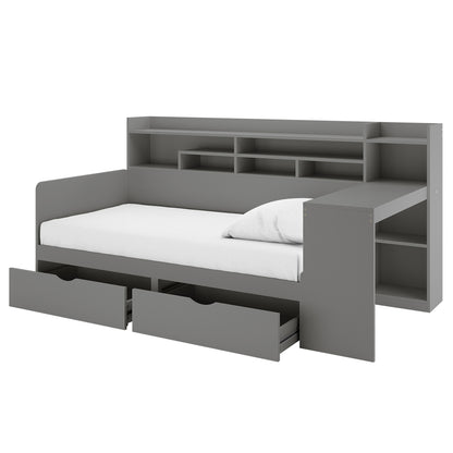 Hally Storage Single Bed with Desk and Drawers in Grey, featuring a low back, side panels, full-width headboard with shelves, two pull-out drawers, and an attached side desk unit.