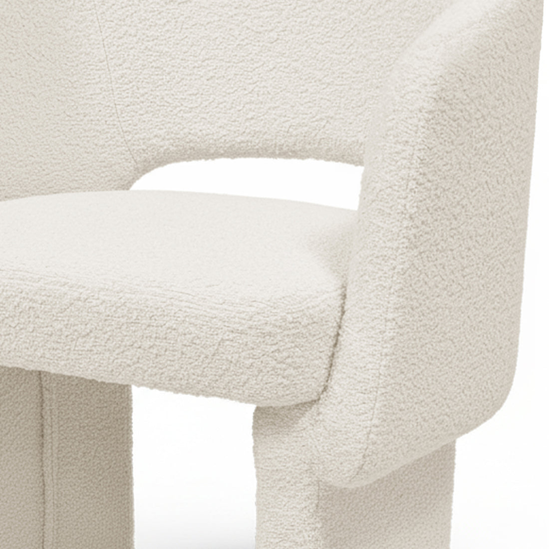 Avela Bouclé Fabric Curved Accent Armchair in Cream White, featuring a textured bouclé seat, curved backrest with cut-out, and visible arm/leg structure, designed for cozy, modern comfort.