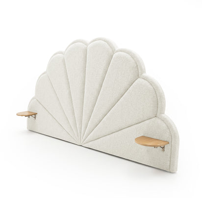 Decorative scalloped upholstered headboard with minimalist floating shelves on white background