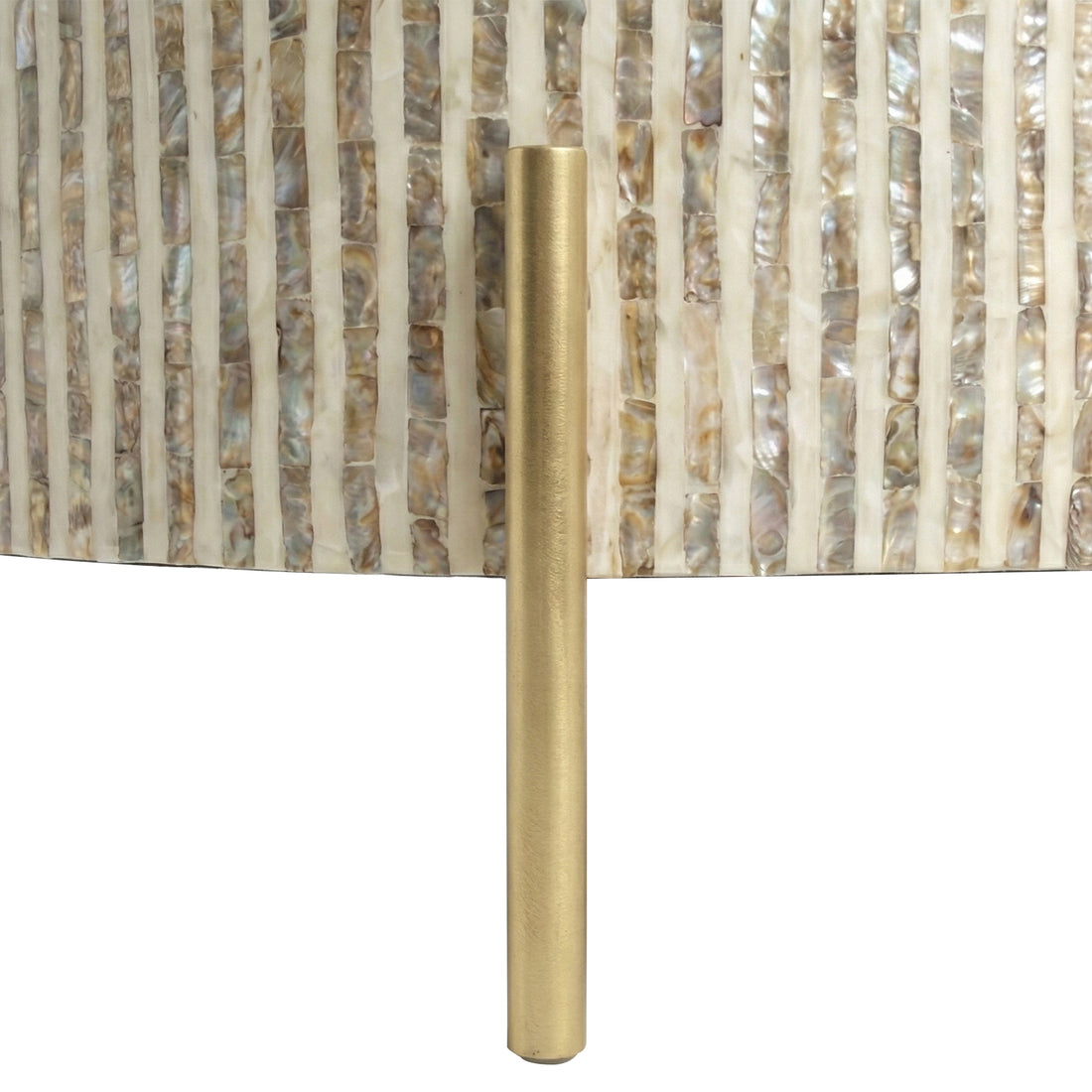 Close-up of textured iridescent surface detail and gold metal rod on white background