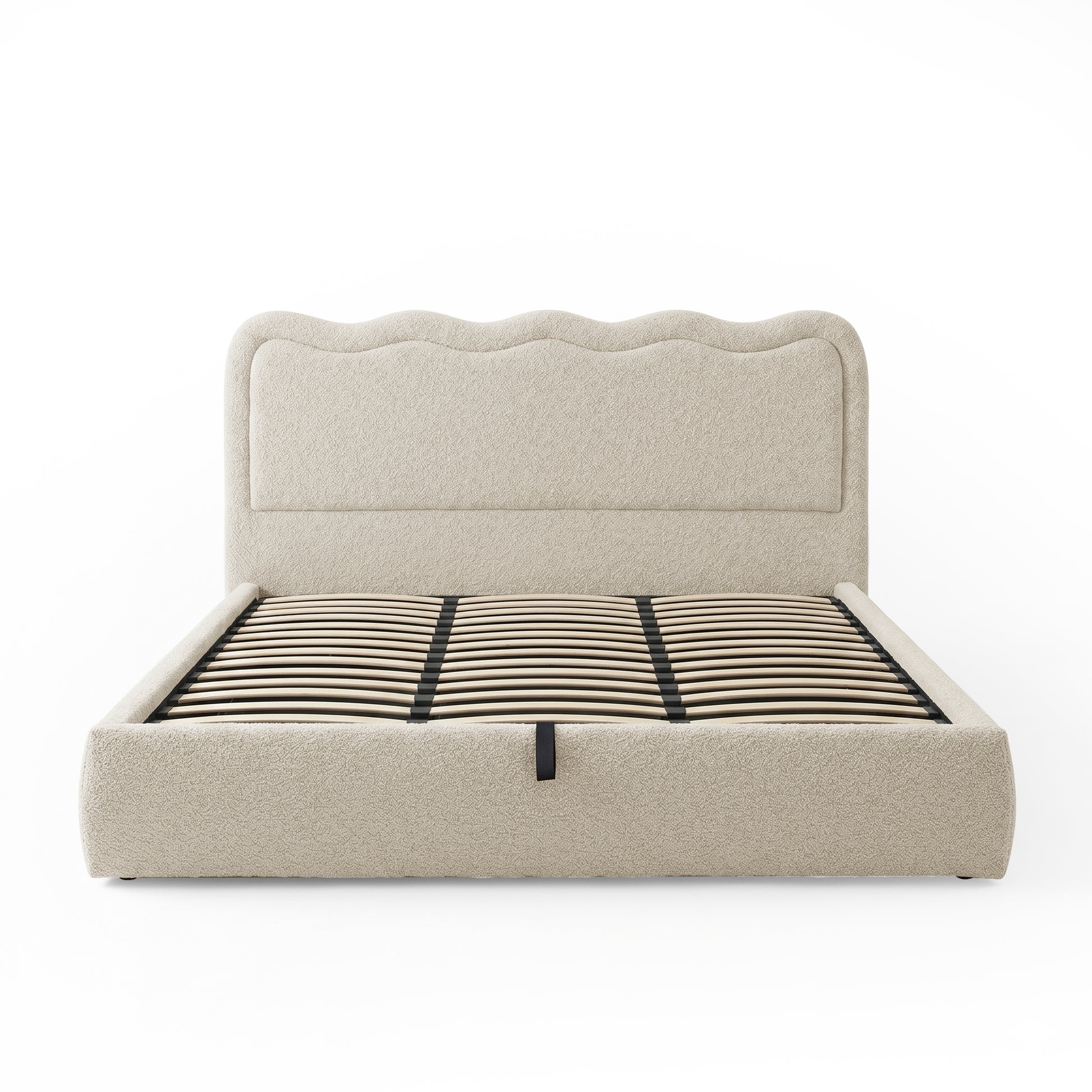 Front view of beige upholstered bed with visible wooden slats