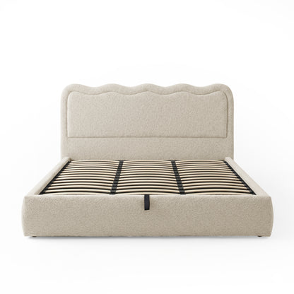 Front view of beige upholstered bed with visible wooden slats