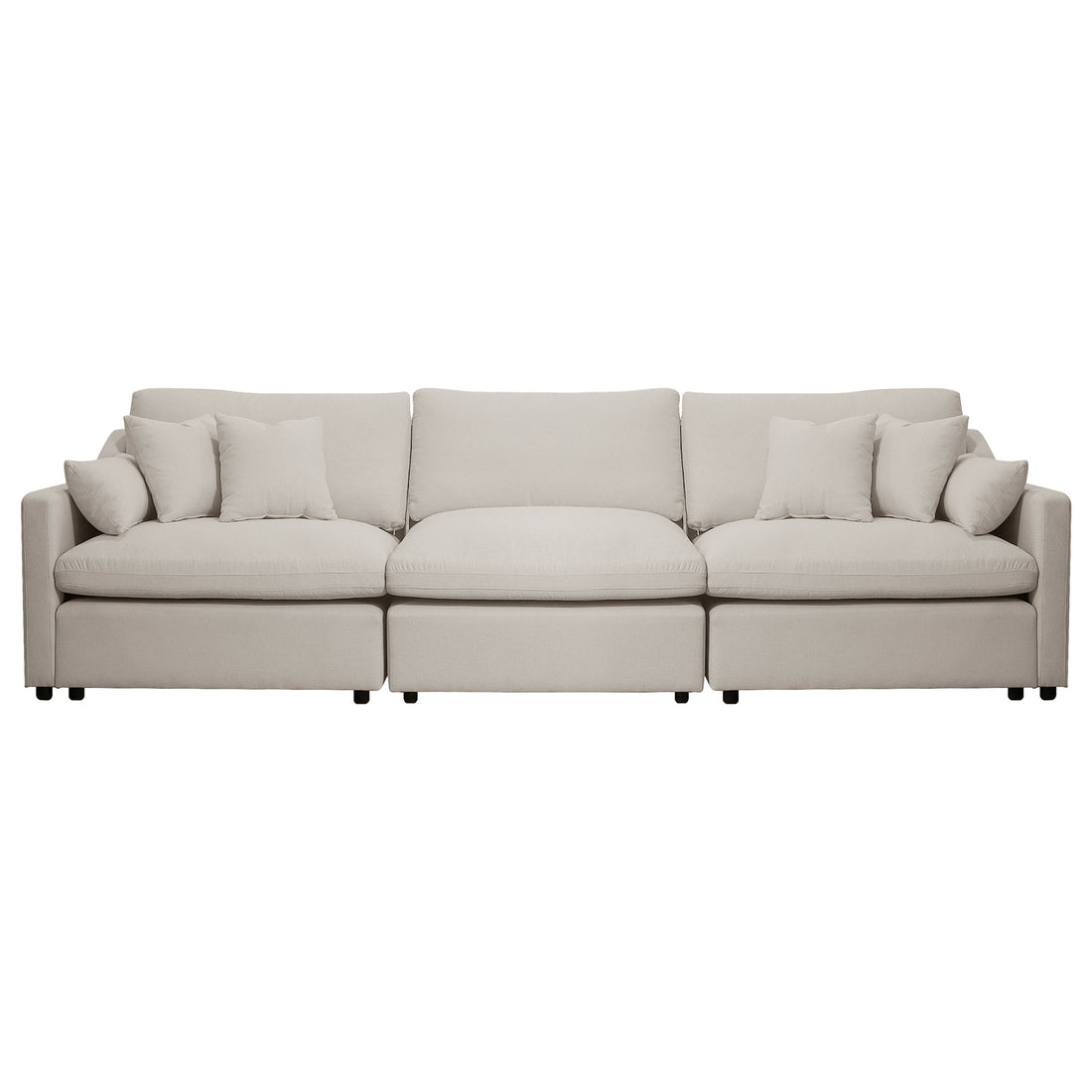 Beige three-seat sofa with five throw pillows on a white background
