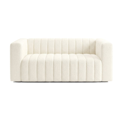 Front view of a cream upholstered sofa on a white background