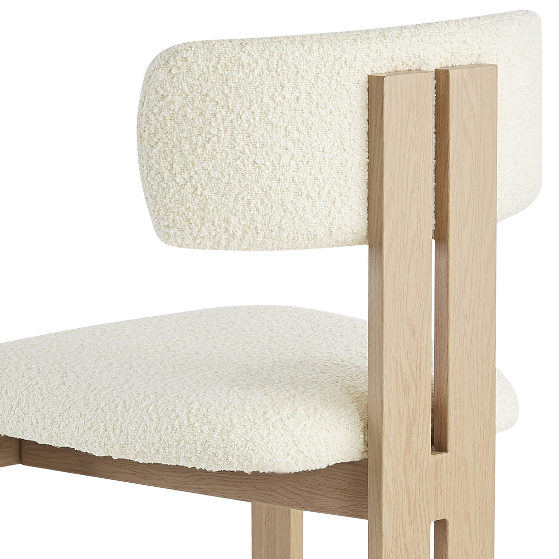 Haleo Curved Boucle Dining Chair Set of 2 in Cream White features a light-wood frame with vertical supports, upholstered in soft boucle fabric, showcasing a modern design with a padded seat and arched backrest.