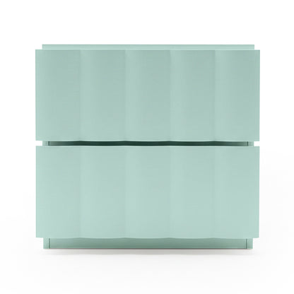 Pastel blue two-drawer nightstand with wavy front on white background