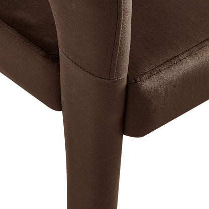 Close-up of Eisha Velvet Dining Chair Set of 2 in Deep Mocha Brown, highlighting suede-style upholstery and stitching on the padded seat where it meets the chair’s leg, emphasizing luxurious texture and craftsmanship.